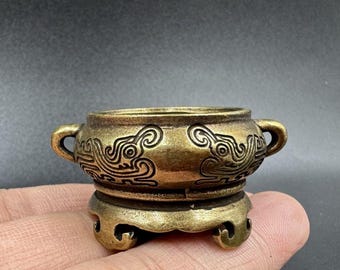 Quemador de incienso pequeño con cara de bestia vintage, decoración oriental para el hogar con base de nube y doble oreja