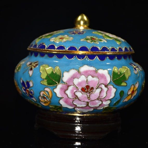 Copper-wire cloisonné work on a miniature ginger jar — a genuinely laborious traditional craft technique producing a jaw-dropping blue peony enamel result.