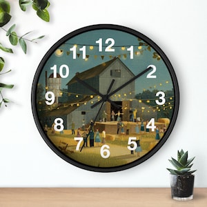 May include: A round wall clock with a black frame featuring a printed scene of a barn dance at night. The clock face displays large white numbers from 1 to 12, black hour and minute hands, and a thin black second hand over a rustic farm illustration.