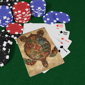May include: A poker game scene with stacks of red, blue, and black poker chips. A playing card with a turtle design is displayed with playing cards showing the number 10. The background is a green felt surface.