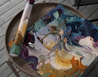 May include: A roll of colorful wrapping paper and a wrapped gift with a bow sit on a wooden table. The wrapping paper and gift have a textured, abstract design in shades of blue, orange, and purple. Scissors and tape are also on the table.