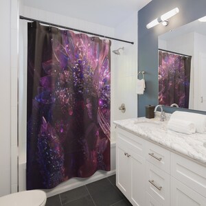 May include: A shower curtain featuring a large, abstract print of crystalline structures in deep shades of purple, magenta, and dark blue. The design displays sharp, geometric facets and glowing light reflections across the fabric surface.