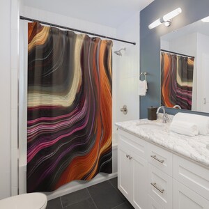 May include: A shower curtain featuring a fluid, abstract pattern of swirling lines in shades of deep black, vibrant orange, warm yellow, and magenta. The design mimics the appearance of layered agate stone with continuous, flowing horizontal curves.