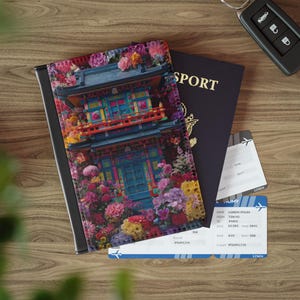 May include: A passport cover featuring a colorful illustration of a pagoda surrounded by flowers. A dark blue passport, two boarding passes, and a car key are also visible on a wooden surface. The word "SPORT" is visible on the passport.