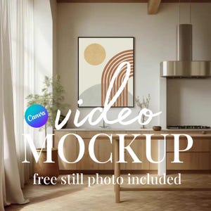 May include: A contemporary kitchen interior featuring a framed abstract art print with a sun and arch design in neutral tones. The image includes a wooden countertop, a stainless steel extractor hood, and the text "video MOCKUP free still photo included".