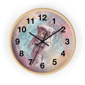 Reloj de pared con ilustración de gato astronauta en el espacio / Reloj para habitación infantil