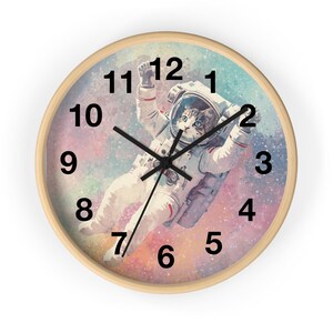 Reloj de pared con forma de gato astronauta, decoración infantil con gatito espacial, arte de galaxia en tonos pastel, reloj para habitación infantil, reloj de pared con animales originales, decoración para habitaciones de bebés y niños.