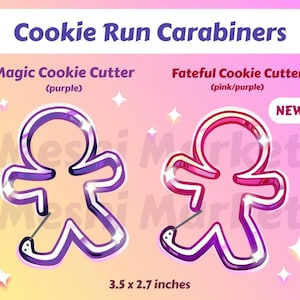 May include: Two cookie cutter carabiners in the shape of gingerbread men. One is purple, labeled "Magic Cookie Cutter", and the other is pink and purple, labeled "Fateful Cookie Cutter". The image includes the text "Cookie Run Carabiners" and "NEW". Each cutter is approximately 3.5 x 2.7 inches.
