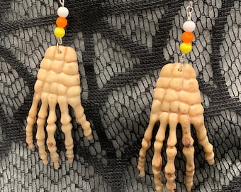 Candy Corn Skeleton Hand Earrings
