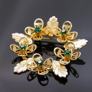 Vintage Gold Tone Brooch With Leave and Floral Design Accented With Emerald Green Rhinestones