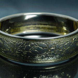 Vintage Gold Tone Bangle Bracelet With Floral Pattern