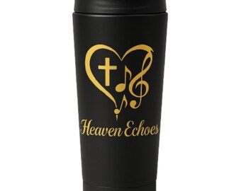 May include: Black travel mug with a gold heart, cross, and musical note design. The words "Heaven Echoes" are printed in gold script below the design. The mug has a black lid and a tapered shape.