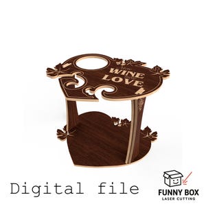 May include: A wooden wine rack with a heart-shaped base and a top that reads "More Wine, More Love." The rack has a dark brown finish with decorative leaf accents and is designed to hold wine glasses and a bottle. The words "Digital file" are at the bottom.