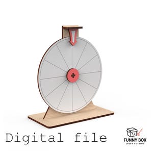 Könnte beinhalten: Ein hölzernes Glücksrad mit weißer Oberfläche und roten Akzenten. Das Rad ist in Segmente unterteilt und hat einen roten Pfeil. Die Basis ist rechteckig, und der Text "Digital file" befindet sich unten.