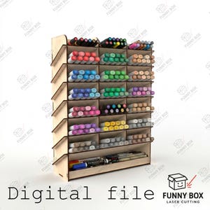 May include: A light-colored wooden desk organizer with multiple horizontal shelves and vertical dividers, filled with a large collection of colorful markers and pens arranged by color in rows, featuring a slanted side profile design.