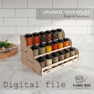 May include: A three-tiered wooden spice rack filled with glass jars of various spices. The rack has a natural wood finish and the text "ORGANIZE YOUR SPICES Style & Function" is visible. The words "Digital file" are also present.