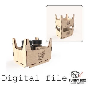 May include: A light-colored wooden storage crate with interlocking joints and an engraved salt and pepper shaker icon on the front. The crate holds two small bottles with black lids. A smaller inset shows a stacked version of the same wooden crate.
