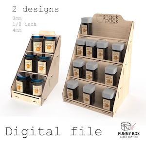 May include: Two wooden display stands, one with honey jars and the other with dried apple jars. The stands are made of light-colored wood and have multiple shelves. The text "2 designs" and "Digital file" are visible.