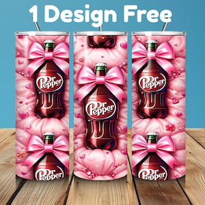 May include: A set of three stainless steel tumblers featuring a Dr. Pepper bottle design with a pink bow and hearts on a pink background. The text "1 Design Free" is at the top.