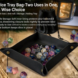 May include: A black dice tray with a flat bottom, holding various colorful polyhedral dice. The tray is made of a leather-like material and has snap closures. Text on the image reads "Dice Tray Bag-Two Uses in One, A Wise Choice".