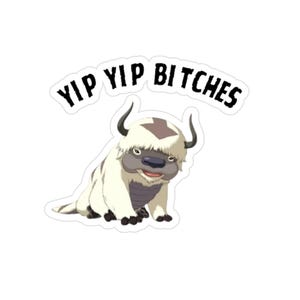 May include: A sticker featuring a cartoon bison-like creature with the text "YIP YIP BITCHES" in a black, bold font. The creature is primarily white with brown and gray accents, and has small horns.