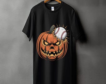 May include: Black t-shirt featuring a Halloween-themed graphic. The design includes an orange jack-o'-lantern with an angry expression and a baseball. The baseball is white with red stitching and is positioned above the pumpkin.