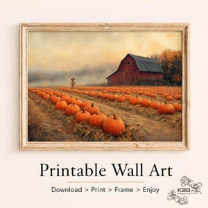 May include: A framed wall art print depicting a rural autumn landscape with a large red barn in the background and a vast field of orange pumpkins in the foreground. A small scarecrow stands in the distance under a soft, hazy, golden sky.
