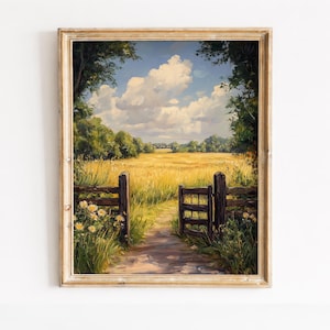 May include: Framed landscape painting depicting a sunny field of golden wheat, a wooden gate, and a path leading into the distance. The sky is blue with fluffy white clouds. Green trees and yellow wildflowers frame the scene.