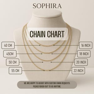 May include: A gold-colored chain necklace display on a mannequin, with a "Chain Chart" graphic. The chart shows chain lengths in both inches and centimeters, including 16 inches, 18 inches, 20 inches, and 22 inches, as well as 40 cm, 45 cm, 50 cm, and 55 cm.