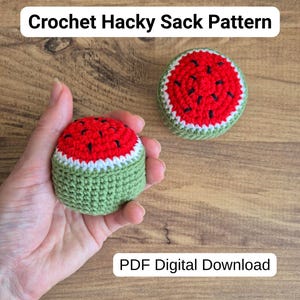 May include: Two round crochet hacky sacks designed to look like watermelon slices. Each features a red top with black embroidered seeds, a thin white border, and a solid green base. The text Crochet Hacky Sack Pattern and PDF Digital Download are visible.