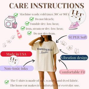 May include: An off-white t-shirt with the text HAPPITALECO Studio printed in black on the chest. The image includes care instructions, icons for washing, ironing, and butterflies, plus labels for Made in USA, Non-toxic inks, SUPER Soft, and Comfortable Fit.
