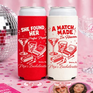 May include: Two can coolers, one red and one ivory, with matching red print. The red cooler says "She Found Her Perfect Match" and the ivory cooler says "A Match Made In Heaven". Both have cocktail and matchbox graphics.