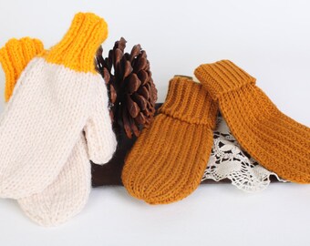 Old fashioned children's mittens, two pairs