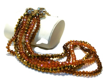 Vintage kralenketting, driekleurige kralen, extra lang, kristalaccenten, goudkleurig, oranje roestgoud, blingy, "Slinky"