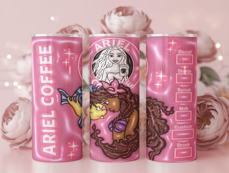 May include: Pink tumbler with "ARIEL COFFEE" text and mermaid-themed graphics. Features a mermaid illustration holding a coffee cup, with drink customization options. The tumbler is approximately 20 cm tall.