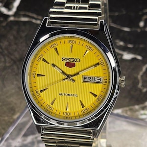 Vintage Seiko 5 Automatic men's wrist watch day&date, Yellow dial Stainless steel band