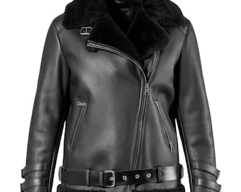 May include: Black faux leather jacket with a shearling collar and lining. The jacket features a diagonal zipper, a belted waist, and cuffs with buckles. The jacket has a classic aviator style.