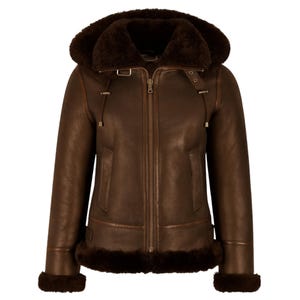 May include: A brown leather jacket with a hood lined with dark brown fur. The jacket features a zipper closure, pockets, and fur trim along the cuffs and hem. The jacket is designed for cold weather.