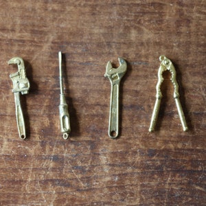 1 Vintage Miniature Brass Tool