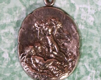 1 Vintage Stamped Cherub Pendant