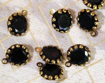 2 Vintage Black Glass and Brass Charms