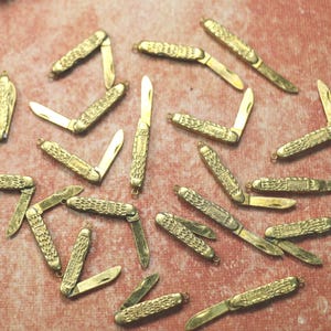 1 Tiny Brass Knife Charm