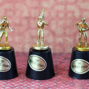 1 Vintage "World's Champ" Sports Trophy - Baseball, Basketball or Football.