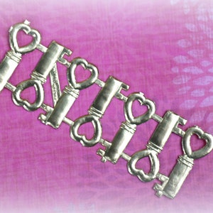 6 Gold Dresden Heart Keys