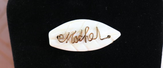Antique Carved Mother of Pearl and Brass 'Mother' Brooch