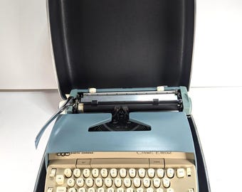 Máquina de escribir eléctrica vintage SCM Smith Corona Coronet con estuche. Probada y en funcionamiento.