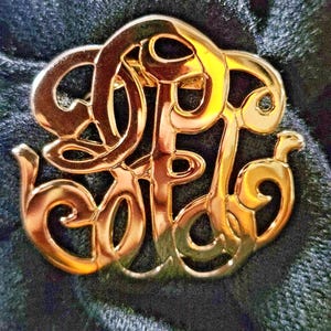 May include: A set of three ceramic mugs with a speckled, matte finish. The mugs are in shades of cream, light gray, and dark gray. Each mug has a simple, minimalist design, perfect for coffee or tea.