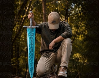 May include: A long sword with a textured metallic hilt and a glowing, translucent blue blade featuring intricate leaf-like patterns. The sword is held upright, showcasing a sharp, pointed tip and a detailed crossguard design.