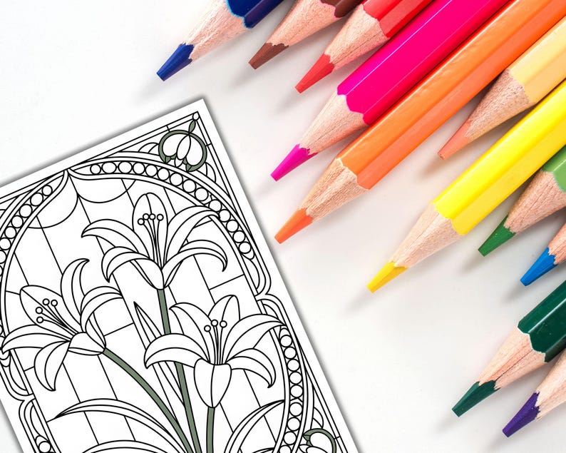 May include: A coloring page featuring a floral design with lilies, alongside a collection of colored pencils in various shades. The pencils are arranged diagonally, with colors including blue, red, pink, orange, yellow, and green. The image is set against a white background.