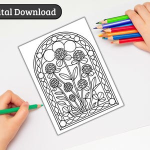 May include: A black and white digital download coloring page featuring a floral design with clover-like flowers and leaves. The words "Digital Download" are in a black oval at the top left. A hand holds colored pencils, and another hand is coloring with a green pencil.